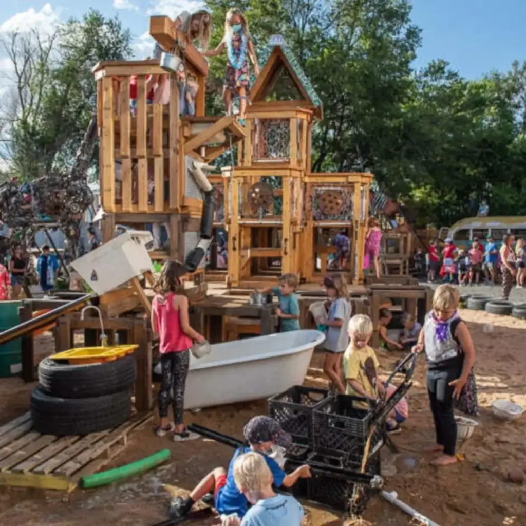 Kids playing outside at the Junkyard