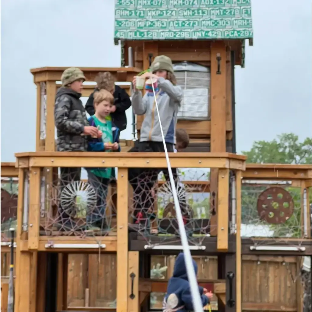 middle-schoolers conducting an experiment using gravity